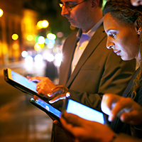 businesswoman using digital tablet outdoors 
